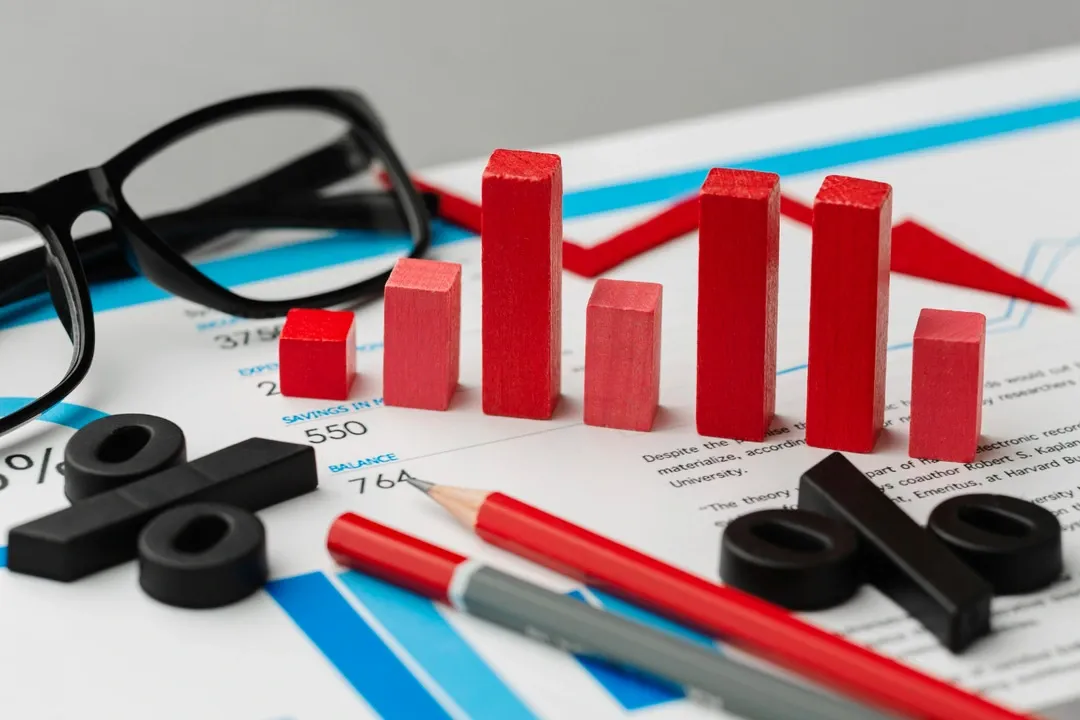 Red bar graph blocks, percentage symbols, and data sheets illustrate smart pricing tactics