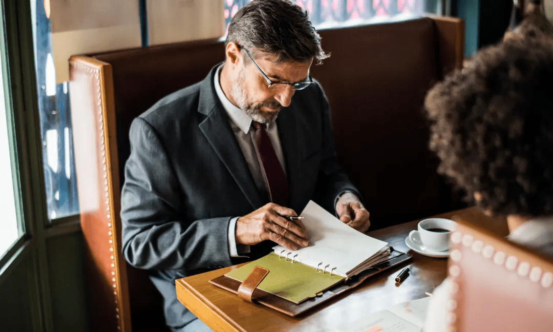 Business registration and legal requirements are being reviewed in a casual setting