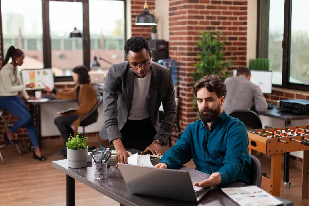 Startup team planning foundation for a rental business in an office workspace