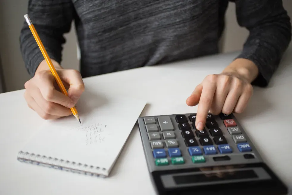 Calculator and notepad for power bank rental pricing strategy