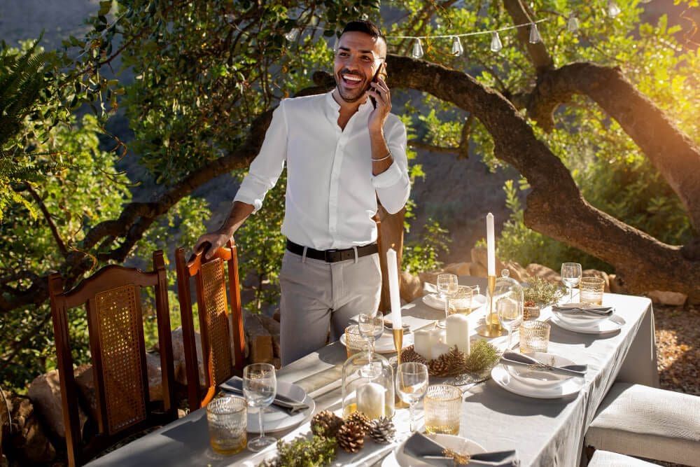 Stylish picnic rental setup with candles and glassware